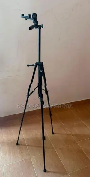 Tripod Camera with Mobile Phone Stand.