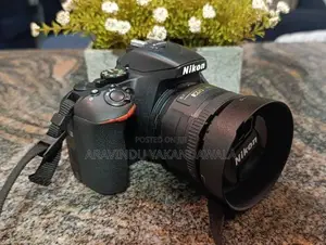 Nikon D5600 Camera (Used) With 2 Lenses Flasher
