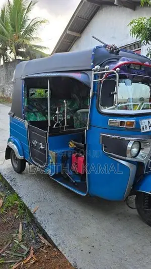 Bajaj RE 2013