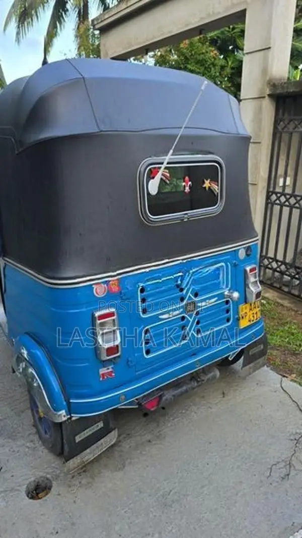 Bajaj RE 2013
