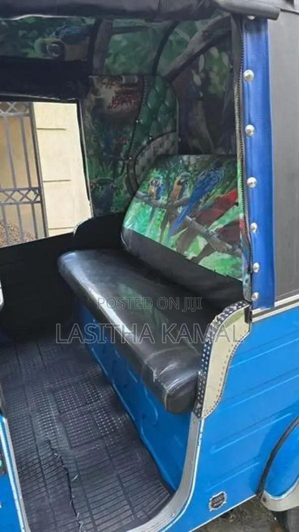 Bajaj RE 2013