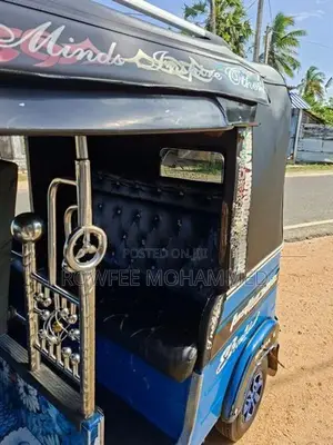 Bajaj RE 2016