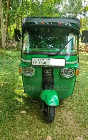 Bajaj RE 2011