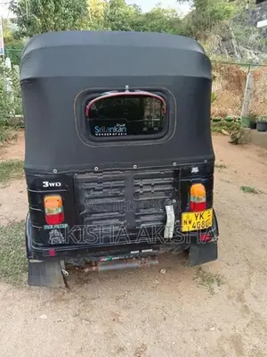 Bajaj RE 2011