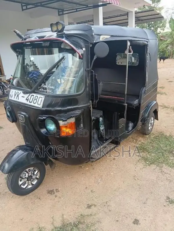 Bajaj RE 2011