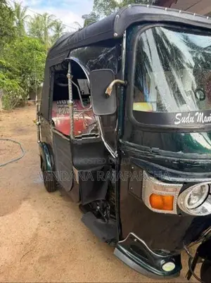 Bajaj RE 2011