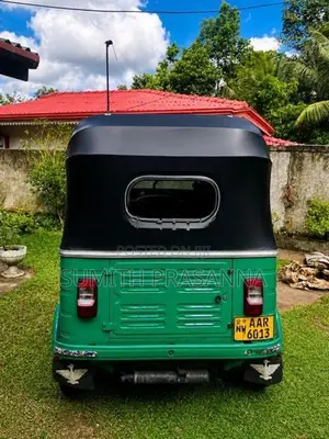 Bajaj RE 2014