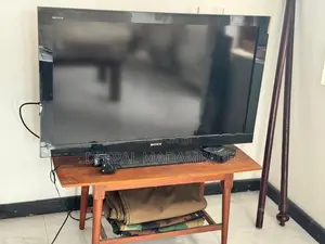 Sony Bravia TV with Wooden Stand