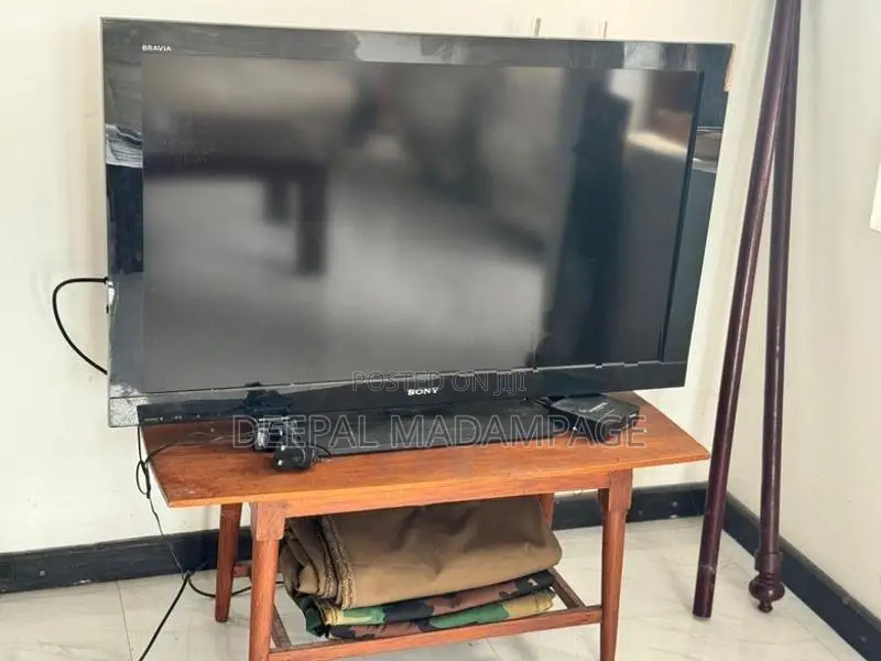 Sony Bravia TV with Wooden Stand