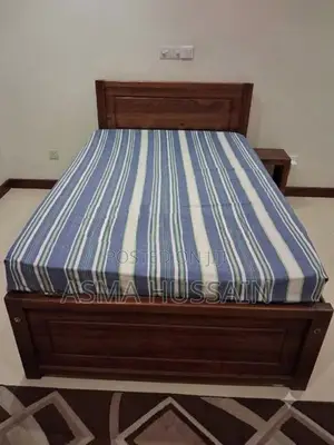 Bed with Bedside Table