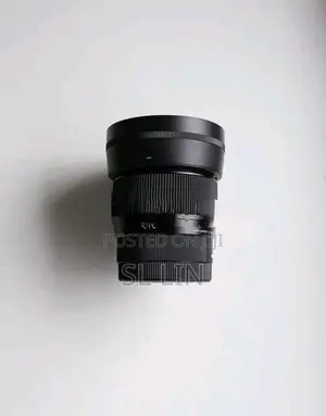 Sony Amm F4 OSS Sigma 56mm F1.4