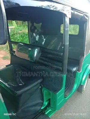 Bajaj RE 2013