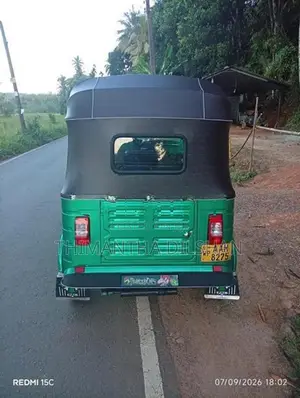 Bajaj RE 2013
