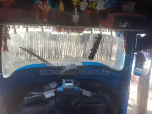 Bajaj RE 2013