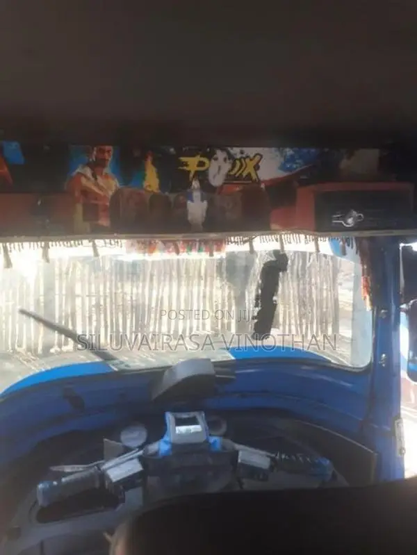 Bajaj RE 2013