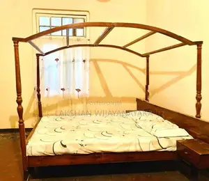 Queen Sized Canopy Bed