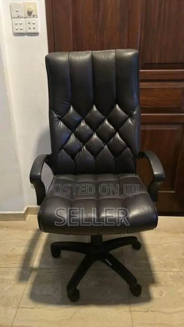 Damro High Back Leather Chair