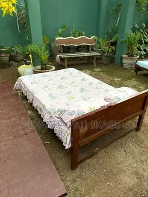 Teak 4 Feet Double Bed with Carved Headboard