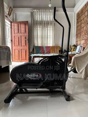 Home Gym Setup (OrbiTrek Elliptical + Ab Shaper Multi-Gym Bench)