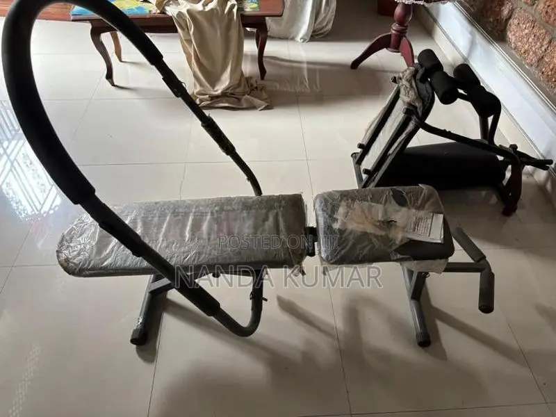 Home Gym Setup (OrbiTrek Elliptical + Ab Shaper Multi-Gym Bench)