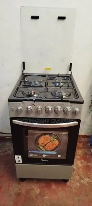 Midea Standing Cooker – 3 Gas Burners + Electric Hotplate With Oven