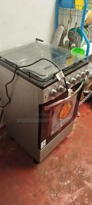 Midea Standing Cooker – 3 Gas Burners + Electric Hotplate With Oven