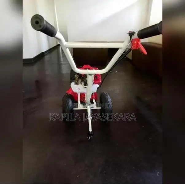 රෝද සහිත තණකොළ කපන මැෂිම