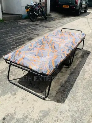 Folding bed with mattress