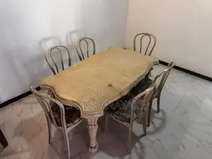 Dinning Table with 6 Cusion Chairs