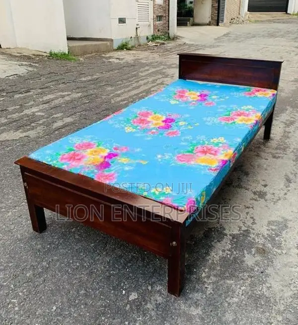 Wooden box bed with mattress