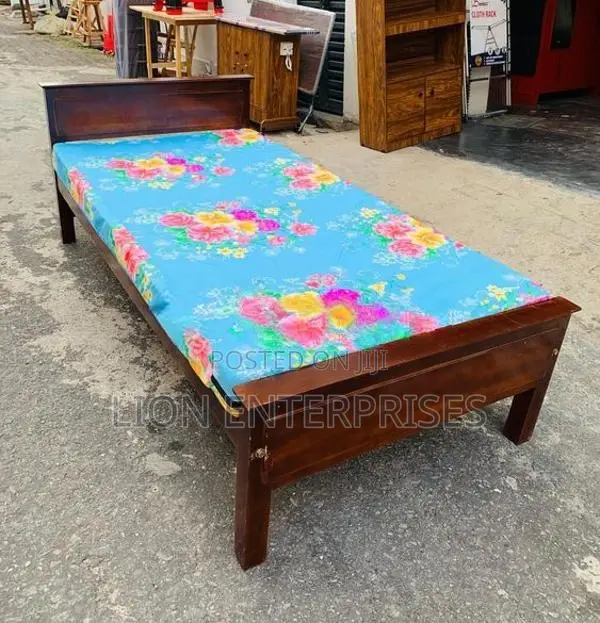 Wooden box bed with mattress