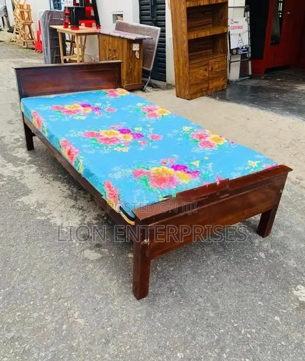 Wooden box bed with mattress