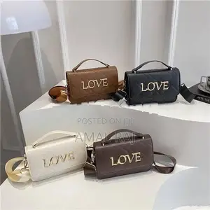 Crossed Hand Bag