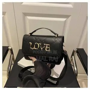 Crossed Hand Bag