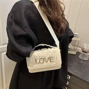 Crossed Hand Bag
