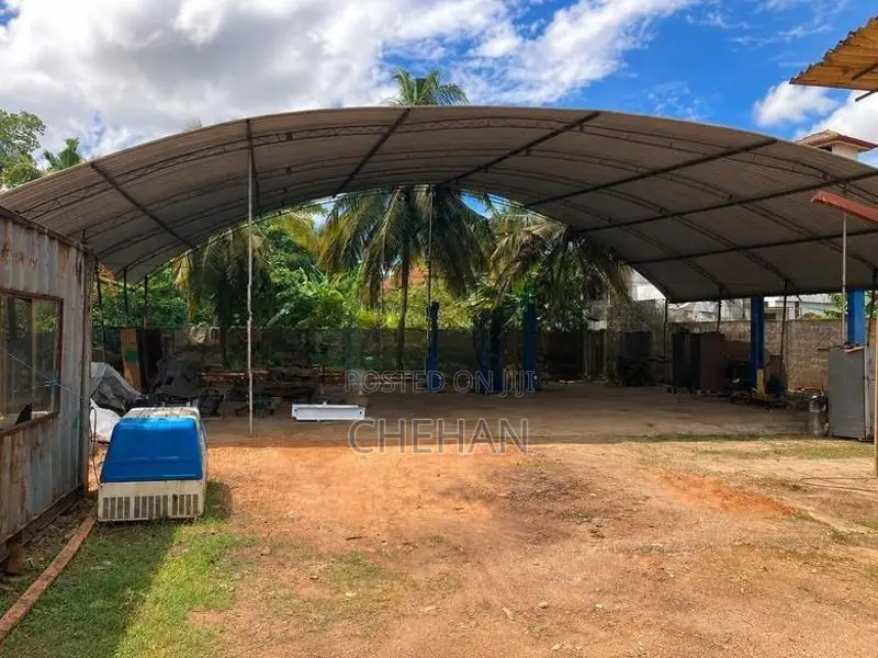 72ft Massive Metal Tent/Shed with 2-Post Car Lift For Sale in Rajagiri
