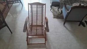 ELEGANT FOLDABLE WOODEN ARMCHAIR