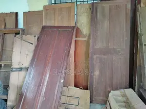 Two Teak Wood Wardrobes (Dismantled)