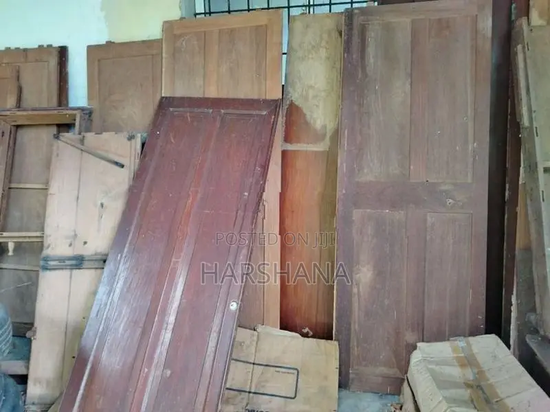 Two Teak Wood Wardrobes (Dismantled)