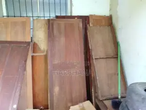 Two Teak Wood Wardrobes (Dismantled)