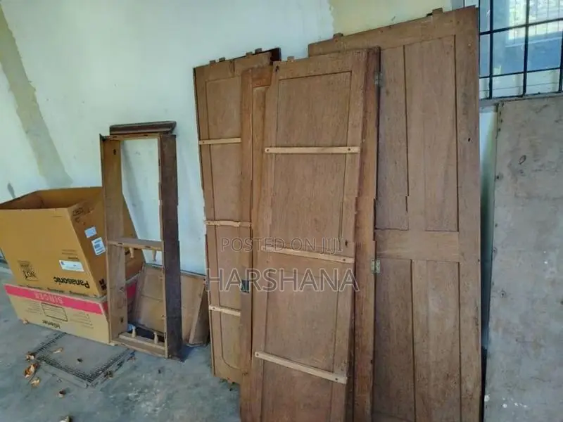 Two Teak Wood Wardrobes (Dismantled)