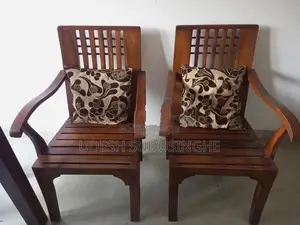 Two Teak Wooden Chairs