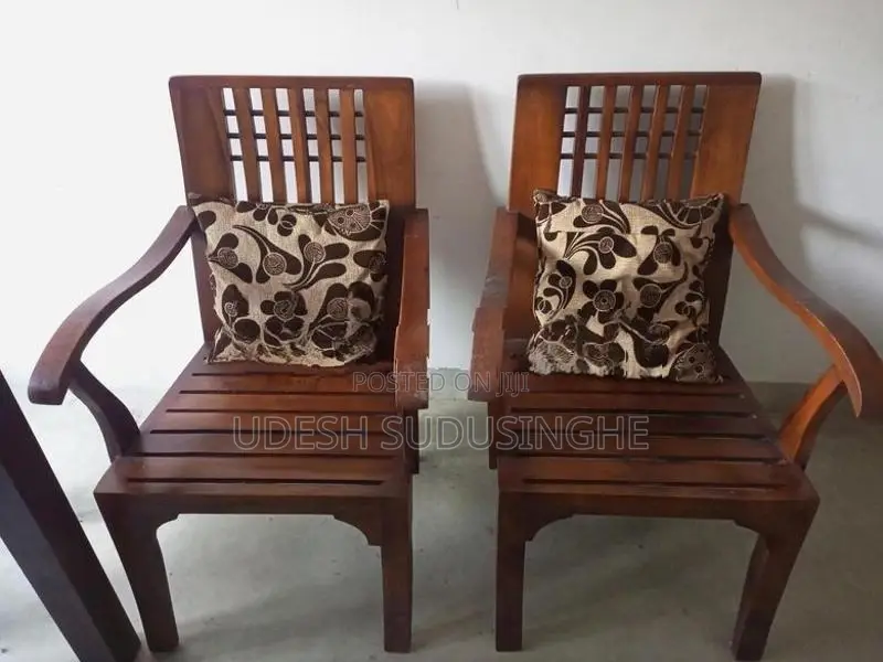 Two Teak Wooden Chairs