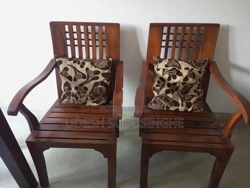 Two Teak Wooden Chairs
