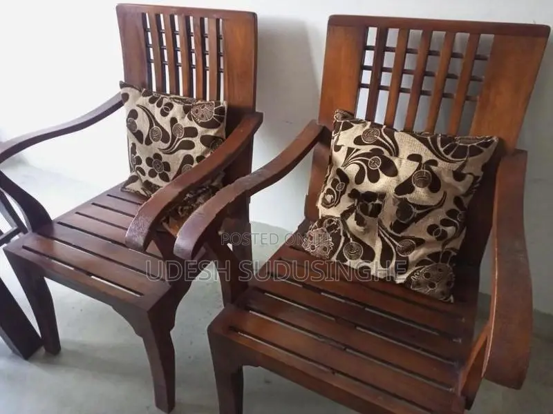 Two Teak Wooden Chairs