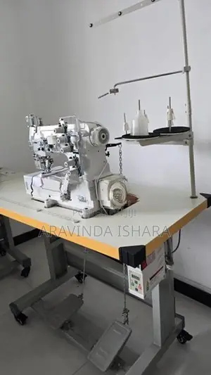 Bob Bobjet - 5 Thread Flat Bed Lock Machine