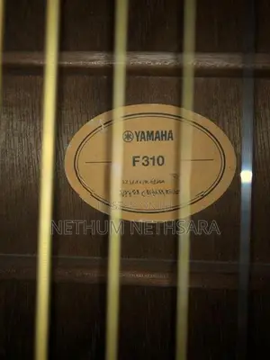 Yamaha F310 Guitar