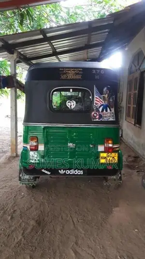 Bajaj RE 2002