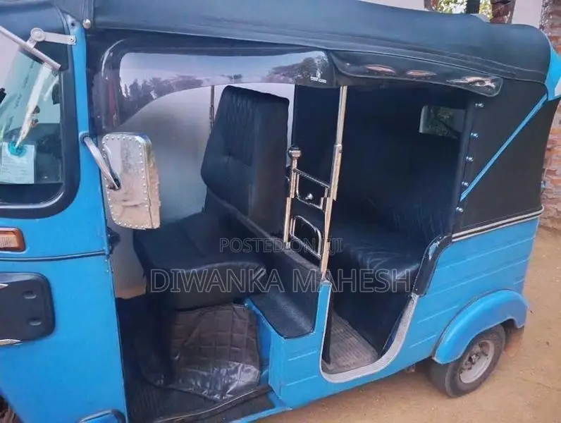 Bajaj RE 2014