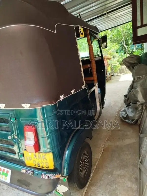 Bajaj RE 2013